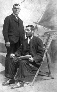 My Grandfather, standing next to his dad, Willie with the Whiskers